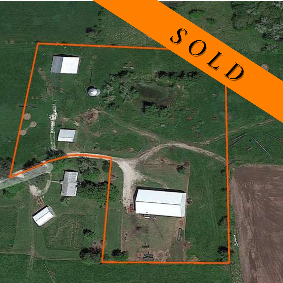 Prime 5-Acre Property with Large Shop and Ideal Grazing Land